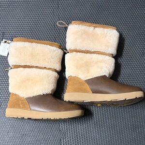 UGG Reykir waterproof wool lined inners .